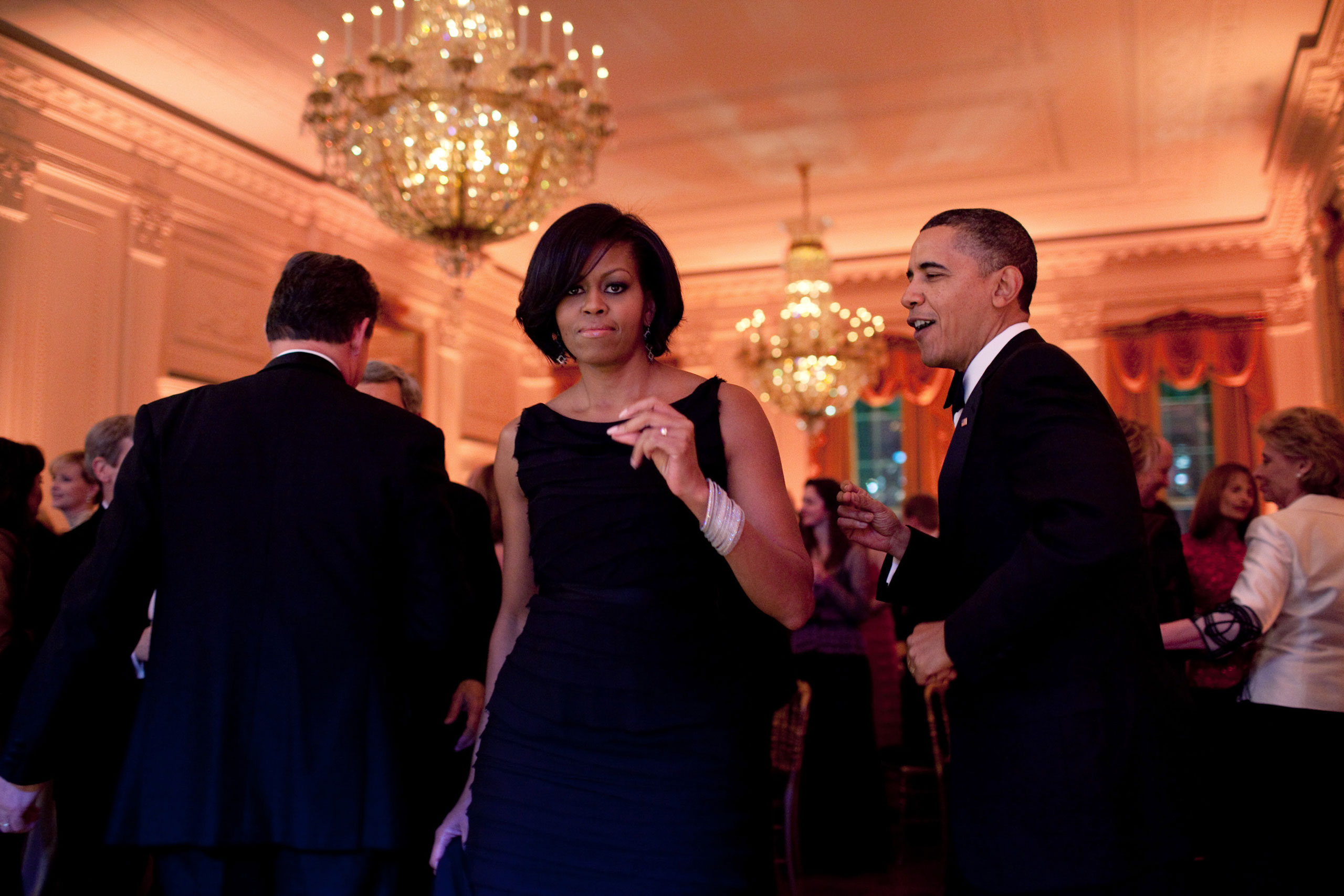 Michelle Obama dancing with Barack Obama