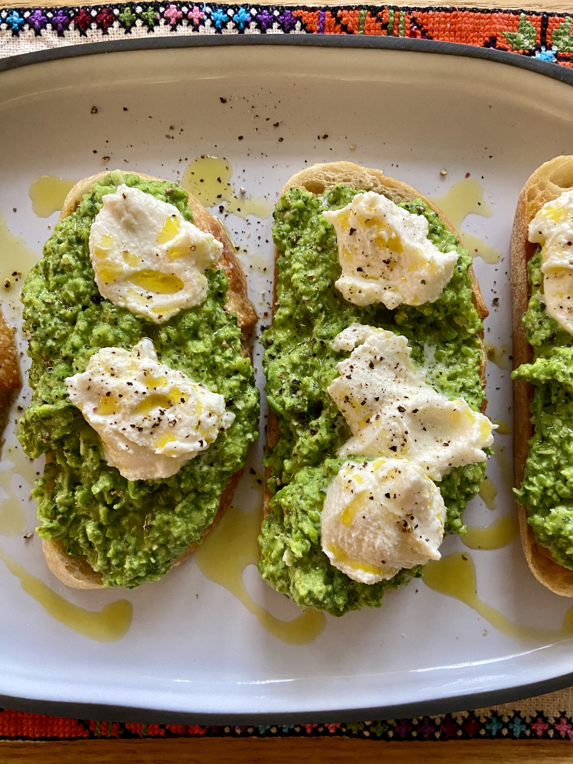 Smashed Pea Toasts with Ricotta