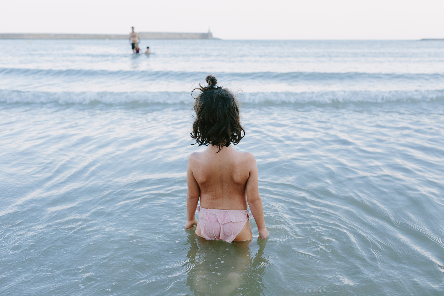little girl in ocean