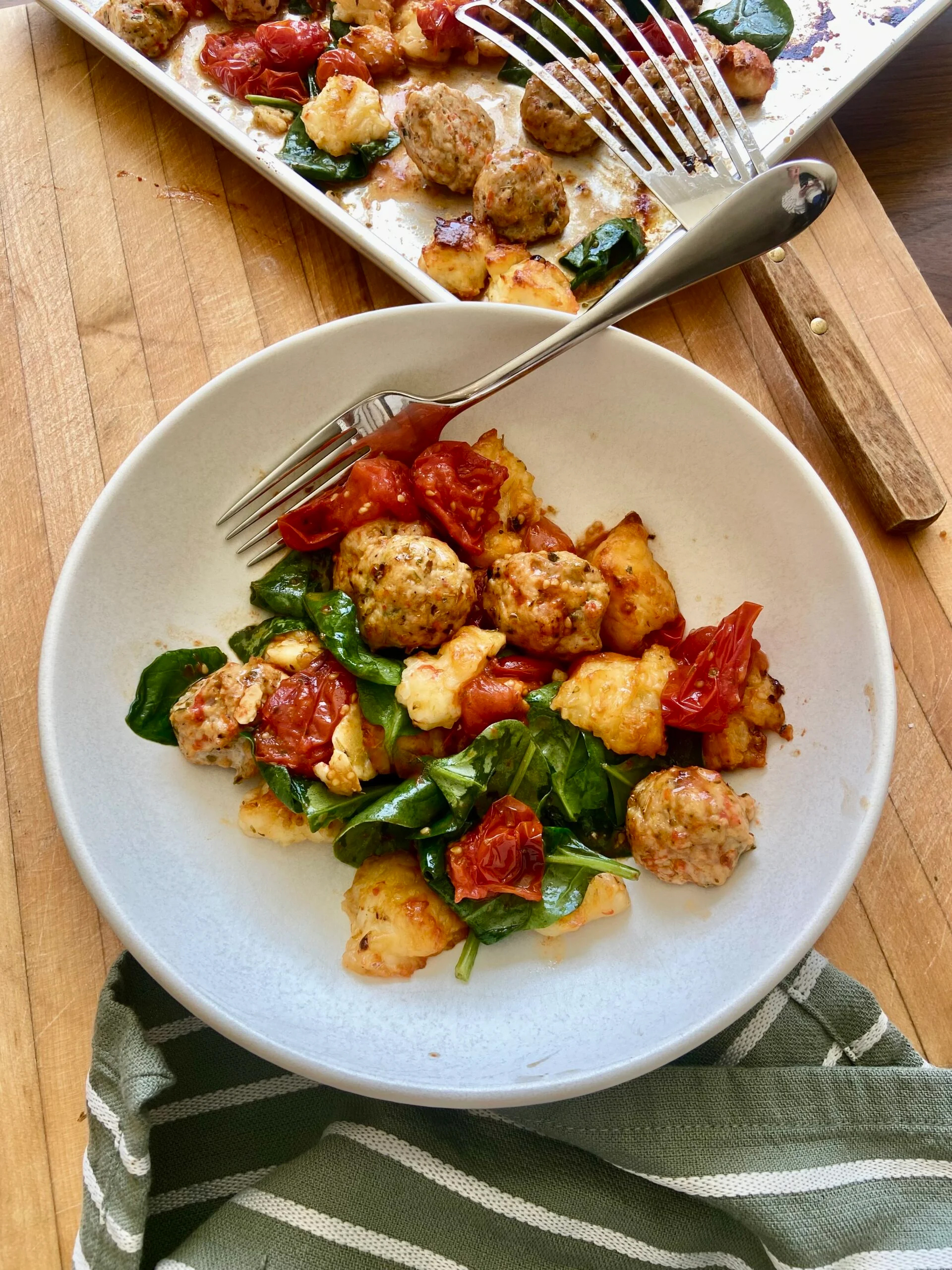 sausage meatballs with halloumi and tomatoes