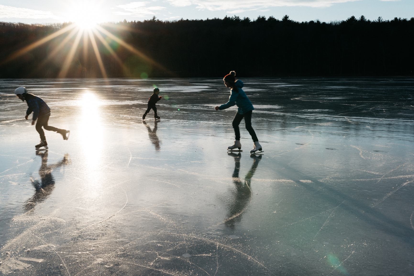 ice skating on a lake